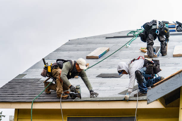 Professional Roofing technician working in Central Village, CT